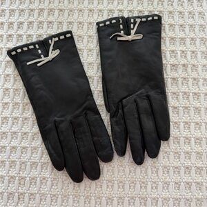 Elegant Black Leather Gloves with White Accents